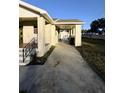 Long driveway leading to the house and detached garage at 2814 Coventry Ave, Lakeland, FL 33803