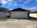 Attached one car garage with driveway at 2488 Hartridge Point W Dr # 2488, Winter Haven, FL 33881