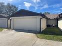 Attached garage with exterior access at 2488 Hartridge Point W Dr # 2488, Winter Haven, FL 33881