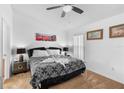 King-size bed, ensuite bathroom access, and ample closet space at 1010 Clear Creek Cir, Clermont, FL 34714