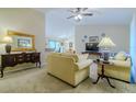 Cozy living room with neutral tones, plush seating, and stylish décor at 12854 Sw 77Th Cir, Ocala, FL 34473