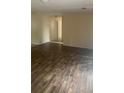 Living room featuring wood-look flooring at 1236 Ne 22Nd St, Ocala, FL 34470