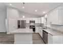 Bright, modern kitchen boasting granite countertops, stainless steel appliances, and ample cabinet space at 15673 Sw 37 Cir, Ocala, FL 34482