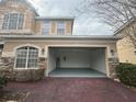 The attached two-car garage is bright, clean and spacious with an automatic door at 1678 Swallowtail Ln, Sanford, FL 32771