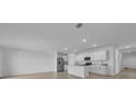 Bright living room with stainless steel appliances and lots of counter space at 744 Osprey Roost Dr, Lakeland, FL 33801