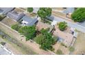 Overhead view of a residential property showcasing the roof, landscaping, and surrounding neighborhood at 4209 Forrestal Ave, Orlando, FL 32806