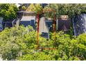 Aerial view of the property lines highlighting the home and surrounding foliage at 1839 Cranberry Isles Way, Apopka, FL 32712