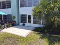Outdoor patio with lush greenery and landscaping at 535 Midway Dr # A, Ocala, FL 34472