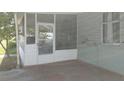 Covered porch entrance offering a shaded outdoor space adjacent to the home's exterior at 6971 Pompeii Rd, Orlando, FL 32822