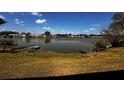 Scenic view of a tranquil lake, showcasing the community's natural beauty at 2055 S Floral Ave # 73, Bartow, FL 33830