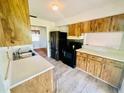 Bright kitchen with stainless steel appliances and wooden cabinets at 2496 Brooke Rd, Fort Meade, FL 33841