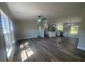 Bright, open floor plan, with modern ceiling fan, and lots of natural light from the large windows at 7005 Dove Meadow Trl, Lakeland, FL 33810
