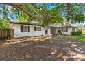 Street view of a one-story home with an attached garage at 1586 Fergason Ave, Deltona, FL 32725