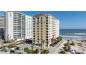 Residential condo building with parking and ocean views at 2071 S Atlantic Ave # 201, Daytona Beach Shores, FL 32118