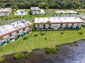 Waterfront condos feature manicured lawn, balconies, and community amenities, offering serene living at 50 Ocean Palm Villa S, Flagler Beach, FL 32136