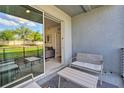 Private patio with seating area, great for relaxing at 4741 Clock Tower Dr # 105, Kissimmee, FL 34746