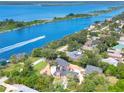 Waterfront property aerial view, showcasing the home and surroundings at 2627 John Anderson Dr, Ormond Beach, FL 32176