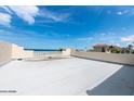 Spacious rooftop deck with ocean views and white balustrades at 3072 Ocean Shore Blvd, Ormond Beach, FL 32176