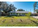 Landscaped lawn, freshly painted exterior at 5700 E Fort King St, Ocala, FL 34470