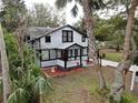 House nestled in a tree-lined neighborhood near the water at 141 Kingston Ave, Daytona Beach, FL 32114