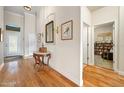 Elegant entryway with hardwood floors, offering views to living areas at 3189 Connemara Dr, Ormond Beach, FL 32174