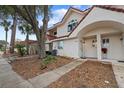Townhome exterior with mature trees and walkway at 3548 Forest Branch Dr # C, Port Orange, FL 32129