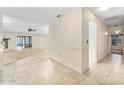 Bright hallway with tile floors leading to other rooms at 56 Winding Creek Way, Ormond Beach, FL 32174