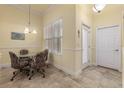 Small breakfast nook with round table and four chairs at 1510 Kinnard Cir, Ormond Beach, FL 32174