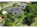 House with solar panels and pool, aerial view at 1068 Hampstead Ln, Ormond Beach, FL 32174