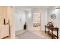 Bright condo entryway with view of bedroom and decorative elements at 2403 S Atlantic Ave # 309, Daytona Beach, FL 32118