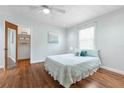 Bright bedroom featuring hardwood floors and a large closet at 67 Ormond Shores Dr, Ormond Beach, FL 32176