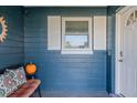 Inviting front porch with white door and window shutters at 1214 Margina Ave, Daytona Beach, FL 32114