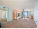 Spacious living room featuring ocean view and ample natural light at 1415 Ocean Shore Blvd # H040, Ormond Beach, FL 32176