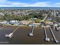 Wide shot of waterfront homes showcasing their location at 1778 John Anderson Dr, Ormond Beach, FL 32176