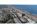 Aerial view showing oceanfront property and its proximity to the beach at 2850 Ocean Shore Blvd # 8, Ormond Beach, FL 32176