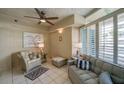 Cozy living room featuring comfortable seating and large windows at 4565 S Atlantic Ave # 5411, Ponce Inlet, FL 32127