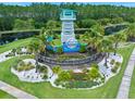 Community entrance with a lighthouse-themed sign and landscaping at 508 High Tide Ln, Daytona Beach, FL 32124