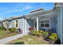 Two-story home with a front porch and walkway at 508 High Tide Ln, Daytona Beach, FL 32124