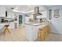 Well-equipped kitchen boasts granite countertops and ample cabinetry at 41 Laurel Oaks Cir, Ormond Beach, FL 32174
