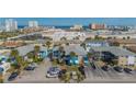 Complex of teal buildings near the beach with ample parking at 2596 Tulane Ave # 4, Daytona Beach, FL 32118