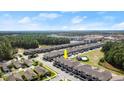 Aerial view of the community highlighting the location, and lush green surroundings at 3411 Gallia St, New Smyrna Beach, FL 32168