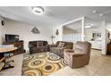 Cozy living room with carpet, comfortable furnishings, and neutral decor at 2301 S Atlantic Ave # 230, Daytona Beach, FL 32118