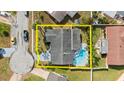 Overhead view showing the property's layout, backyard pool, and proximity to neighboring homes at 4 Water Oak Cir, Ormond Beach, FL 32176