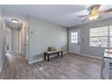 Spacious living area with new flooring, a bench, and a view of the outdoors at 354 Fir St, Ormond Beach, FL 32174