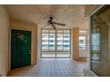 Spacious lanai featuring tiled floors, large windows offering lots of natural light and an exterior view at 4555 S Atlantic Ave # 4609, Port Orange, FL 32127