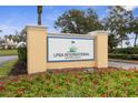 Entrance sign to LPGA International Daytona Beach, beautifully landscaped with colorful flowers at 5 Captiva At Lionspaw, Daytona Beach, FL 32124