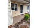 Inviting front porch with neutral siding and a 'For Sale' sign in the window at 10891 Sw 86Th Ave, Ocala, FL 34481