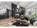 Stylish living room featuring high ceilings, hardwood floors, and a modern design at 1060 Still Rd, Pierson, FL 32180