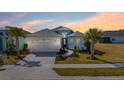 Charming single-Gathering home with a well-manicured lawn, front yard and a two-car garage at 540 Good Life Way, Daytona Beach, FL 32124
