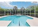 Private screened-in pool with spa, perfect for relaxation and entertaining at 6 Talaquah Blvd, Ormond Beach, FL 32174